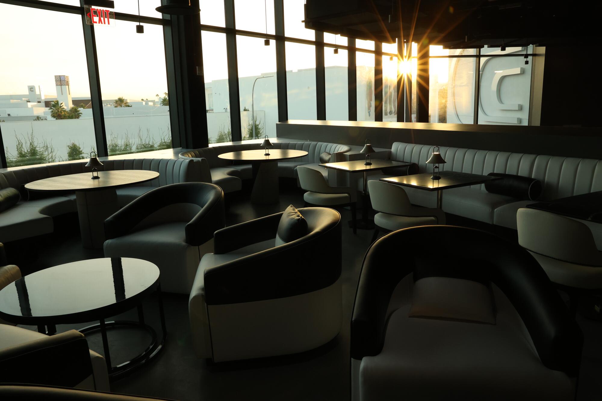 Dining tables and booths in an Inglewood venue.