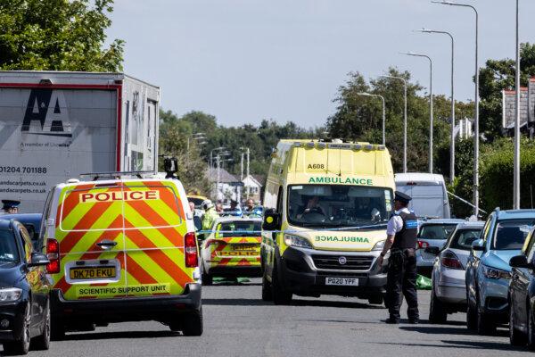 Police on Hart Street where a man has been detained and a knife seized after a number of people were injured in a reported stabbing in Southport, Merseyside, England, on July 29, 2024 (James Speakman/PA)