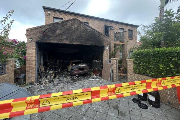 A burnt-out garage following an explosion caused by an e-bike charging in Sydney, Australia, on March 20, 2023. (AAP Image/Supplied by Fire and Rescue NSW)