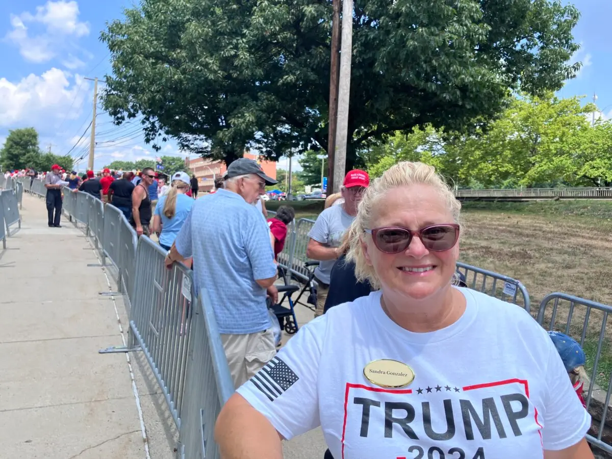 Sandra Gonzalez, 59, of York Haven, Pennsylvania, volunteers at a rally for former President Donald Trump outside New Holland Arena in Harrisburg, Pa., on July 31, 2024. (Janice Hisle/The Epoch Times)