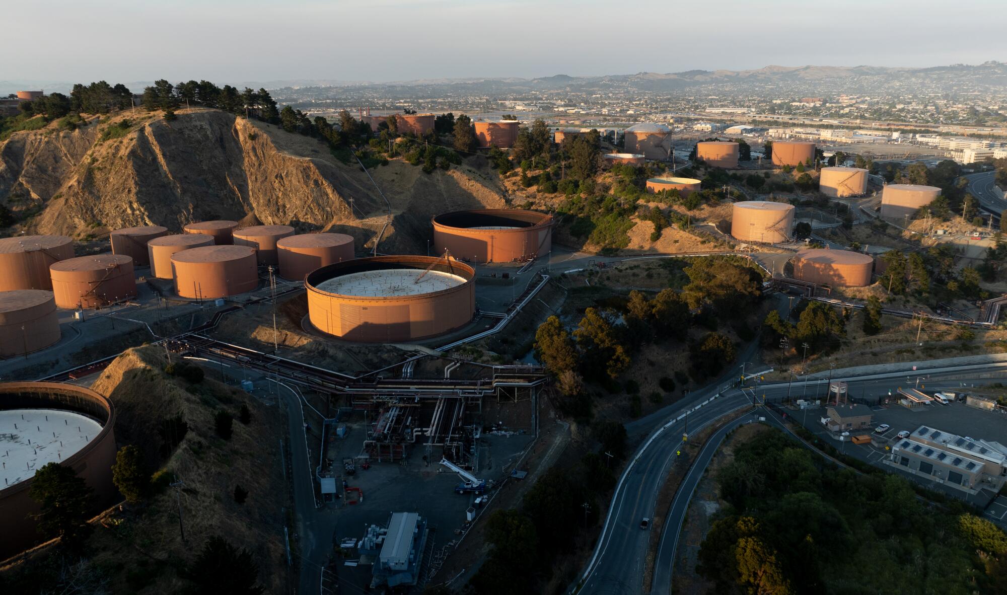 An aerial view of a sprawling complex of tanks.