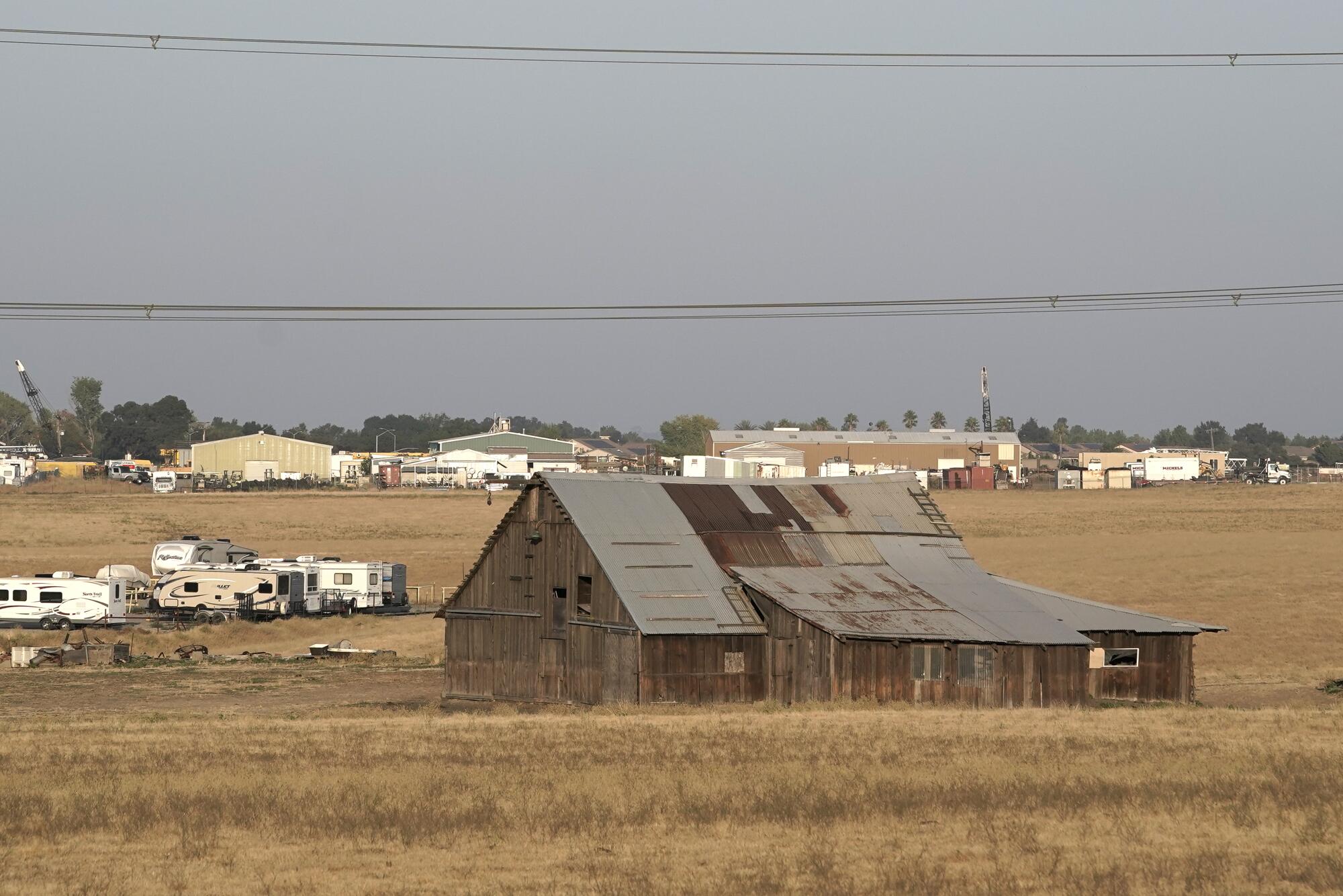 A farm building and RVs near Rio Vista, Calif. 