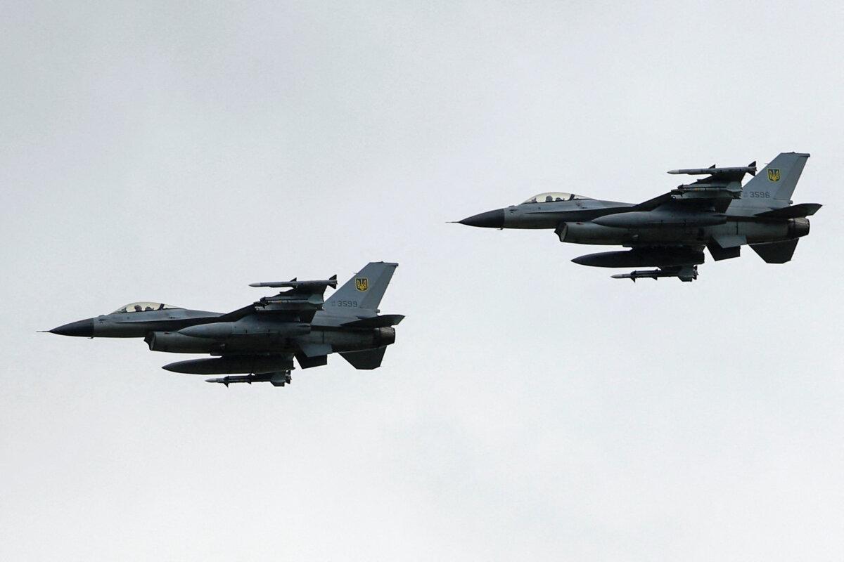 Ukrainian F-16 fighting aircraft at an undisclosed location in Ukraine on Aug. 4, 2024. (Valentyn Ogirenko/Reuters)