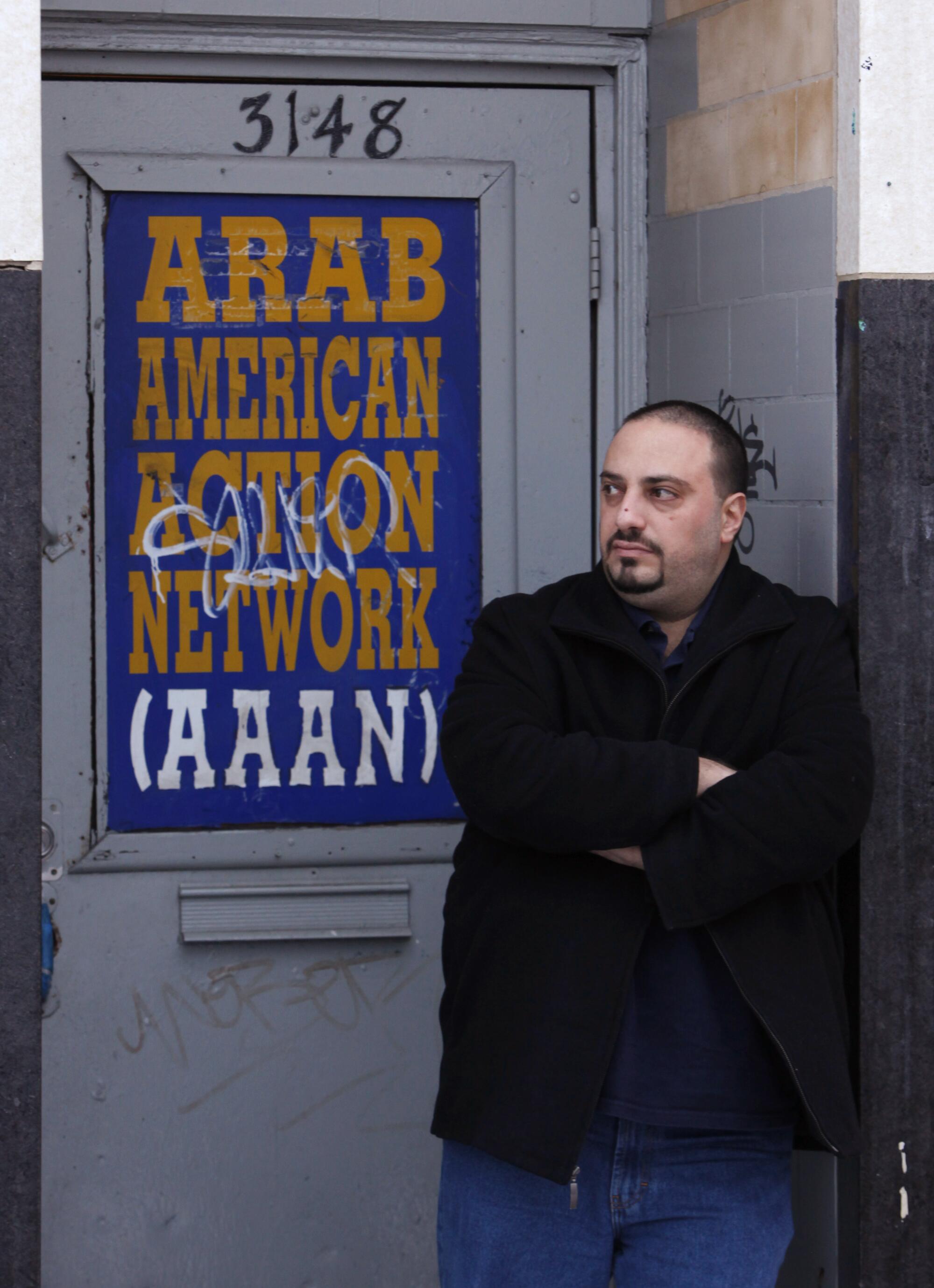 In this photo taken Jan. 27, 2011, Hatem Abudayyeh poses outside the office of 