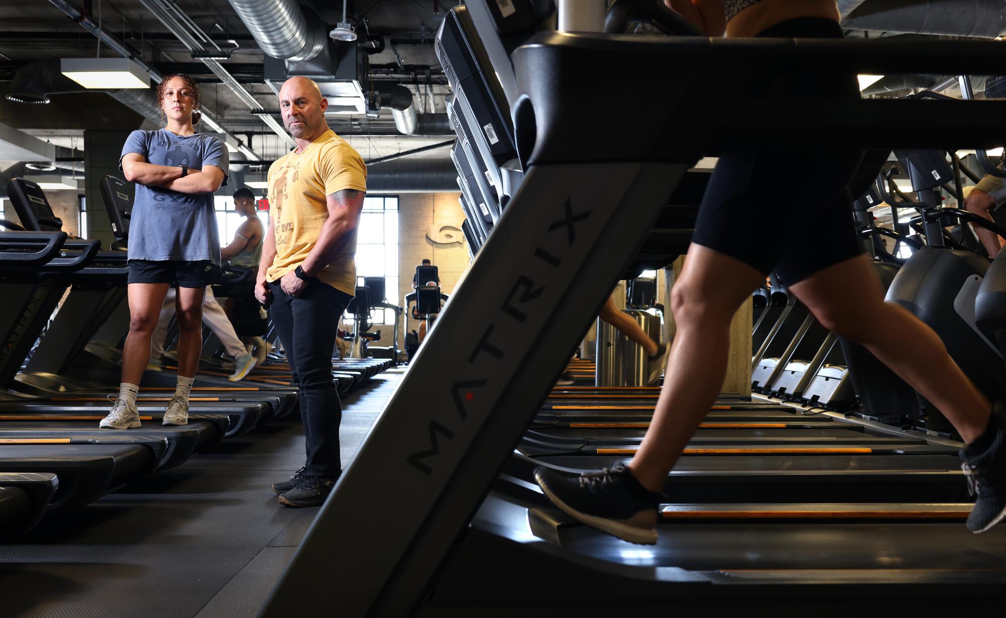 Physical trainer Patricia Rubio, left, and Mike Mitchell, vice president of fitness for Gold's Gym SoCal.