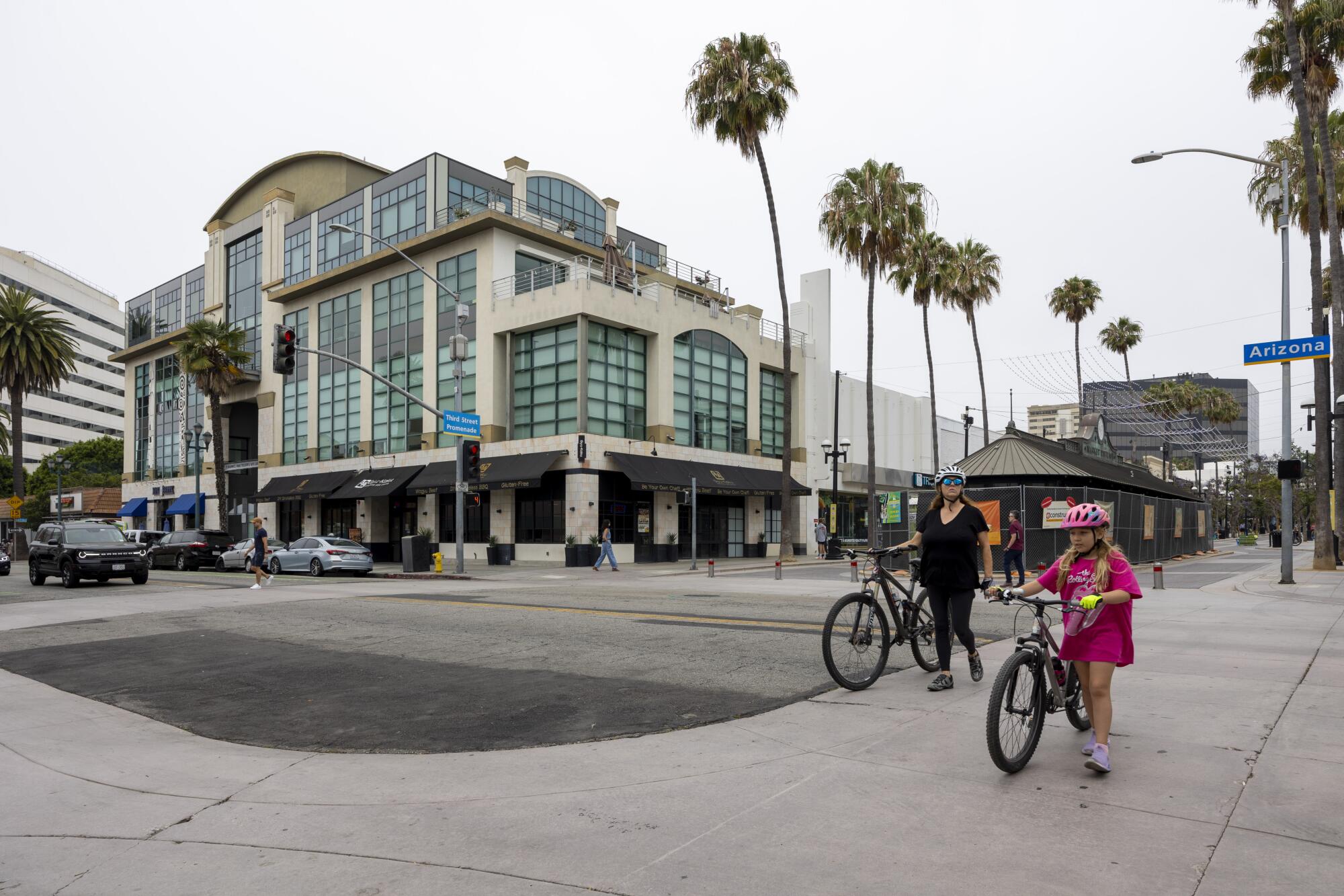 People on bicycles near Third Street Promenade.