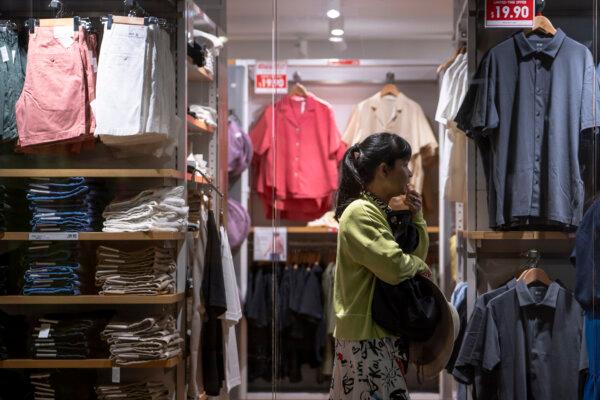 People shop at a clothing store in Washington, on May 29, 2024. (Madalina Vasiliu/The Epoch Times)