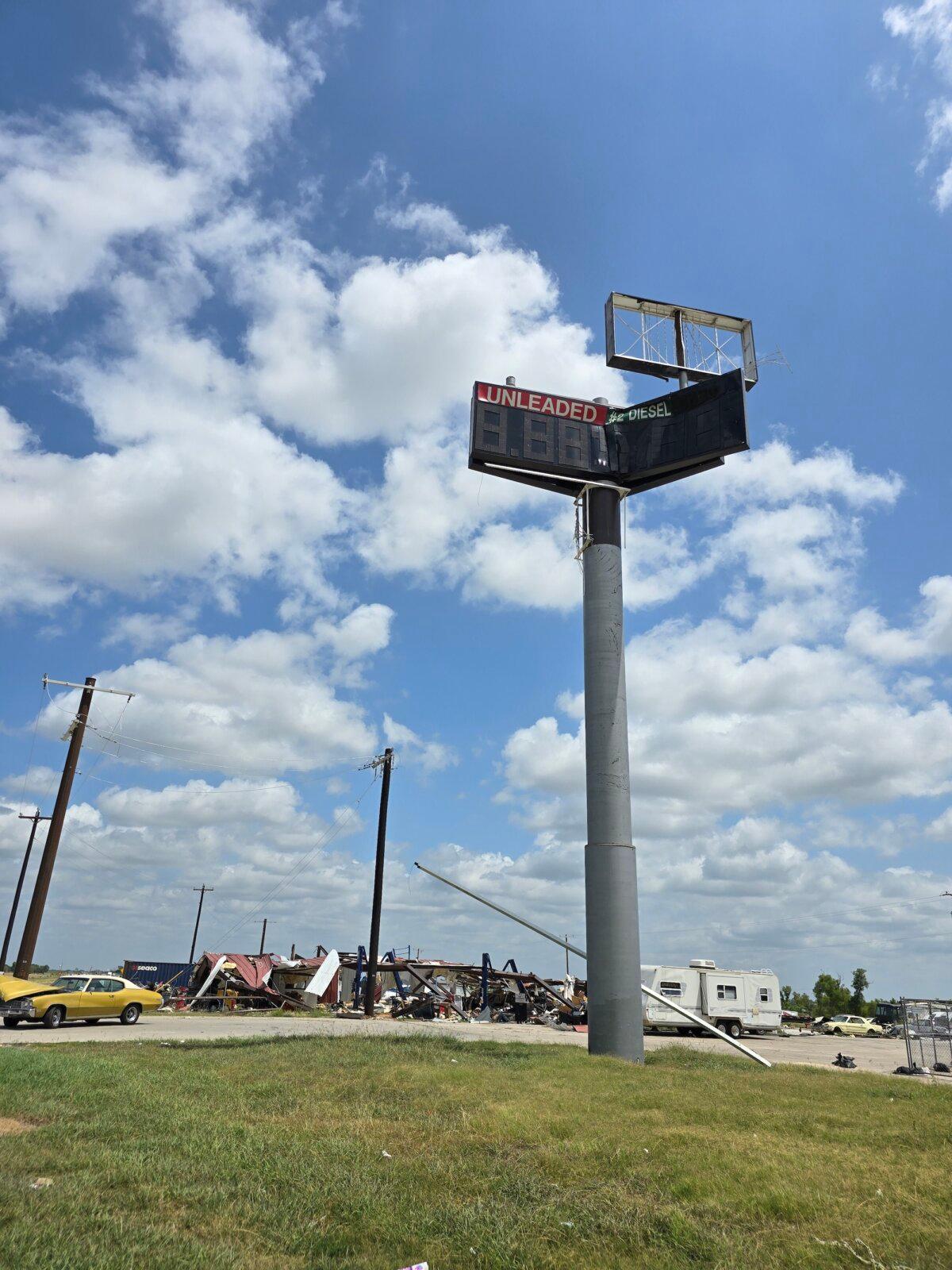 The destroyed Shell gas station sign near I-35 in Valley View, Texas, on July 25, 2024. The building took a direct hit from an EF-3 tornado on May 25, 2024. (Allan Stein/The Epoch Times)