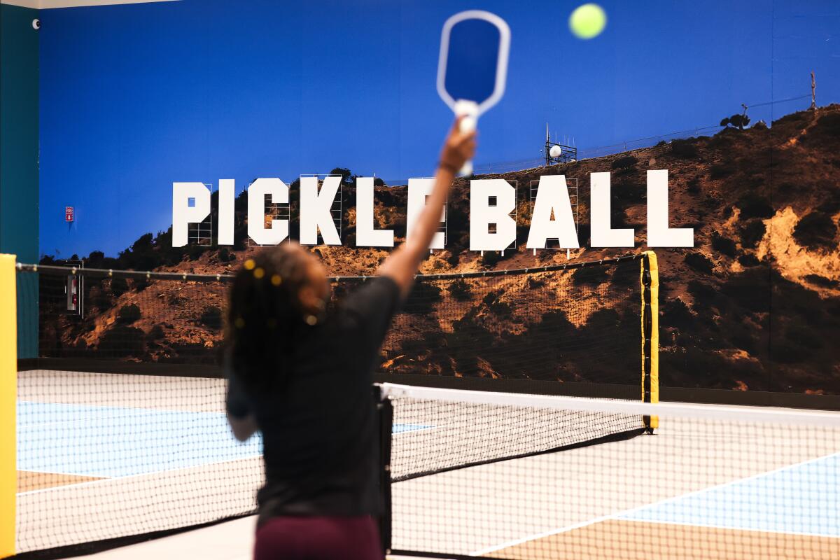 Love.Life personal trainer Shelle Tarver plays on the pickleball court.