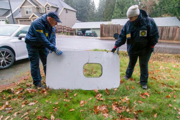 The door plug from Alaska Airlines Flight 1282, in Portland, Ore., Jan. 8, 2024. (National Transportation Safety Board via AP)