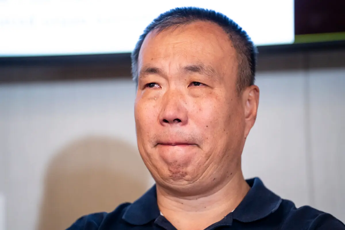 Cheng Peiming, a Falun Gong practitioner who had part of his liver and lung forcibly removed in China, at a press conference in Washington on Aug. 9, 2024. (Madalina Vasiliu/The Epoch Times)