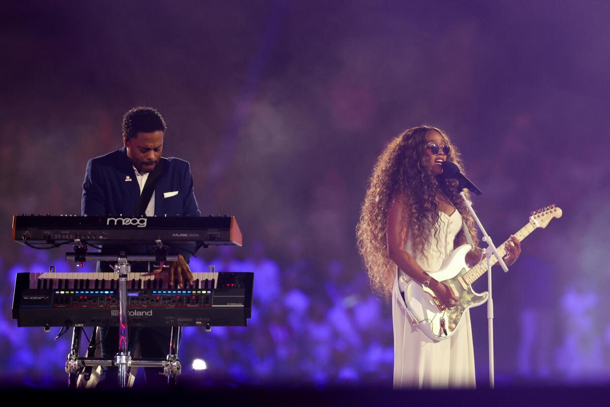 H.E.R. performs the U.S. national anthem during the closing ceremony of the 2024 Paris Olympics at Stade de France 