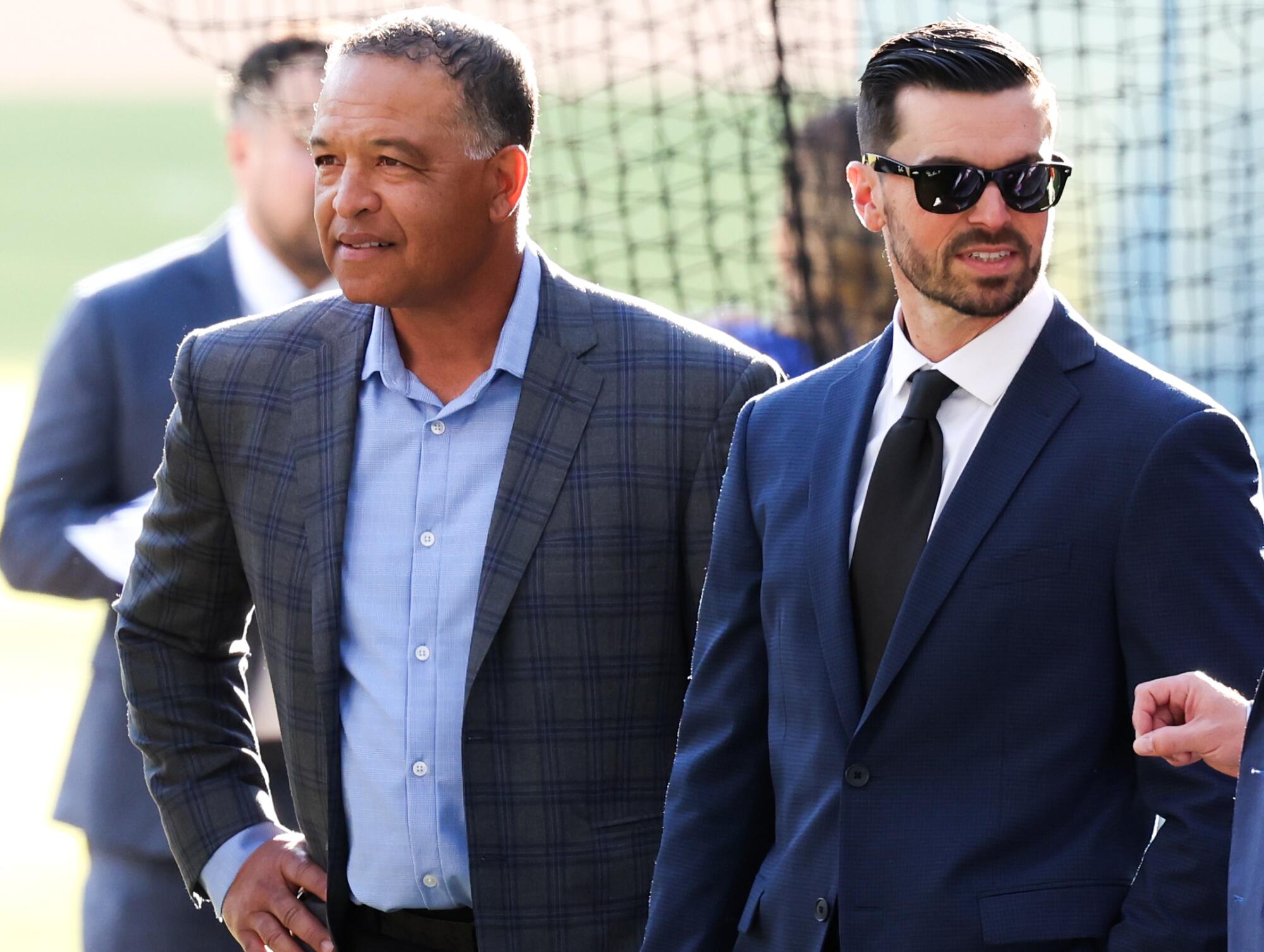 Dodgers manager Dave Roberts, left, and GM Brandon Gomes during Shohei Ohtani's introductory news conference in December.