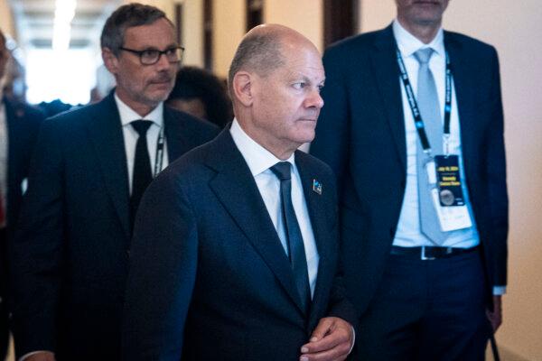 Germany Chancellor Olaf Scholz leaves after meeting with lawmakers and NATO leaders during a visit to Washington on July 10, 2024. (Madalina Vasiliu/The Epoch Times)